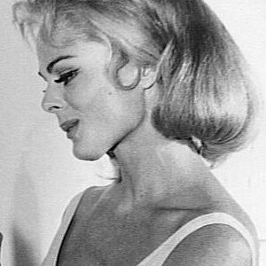 Actress Dee Hartford with blond hair and sweet expression