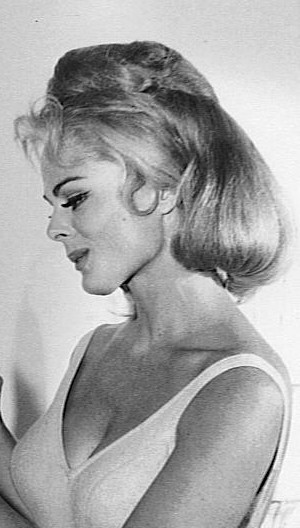 Actress Dee Hartford with blond hair and sweet expression