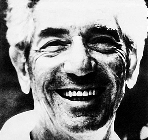 Photo of actor John Marley smiling broadly from the poster for the movie Faces